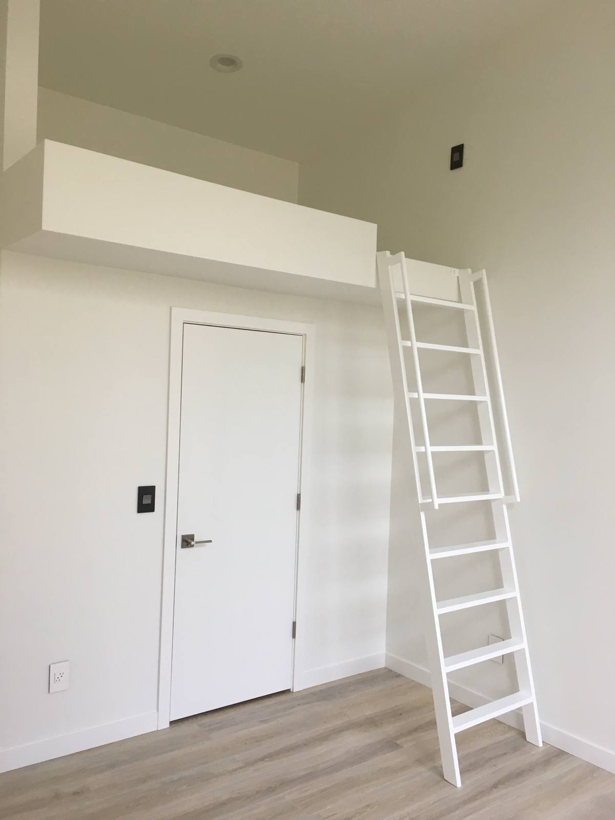 Custom steel wall-mounted ladder by Cascade Mobile Welding