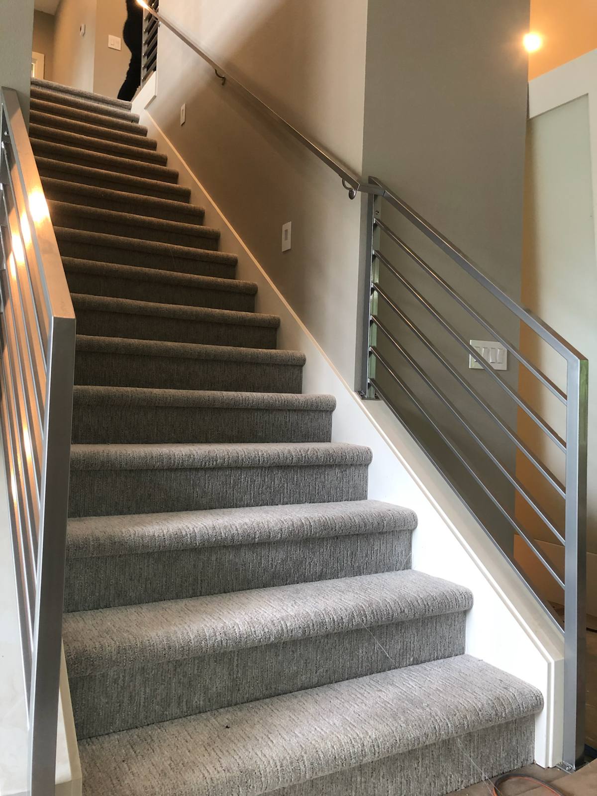 Modern horizontal-bar metal stair railing — custom metal railing, Portland