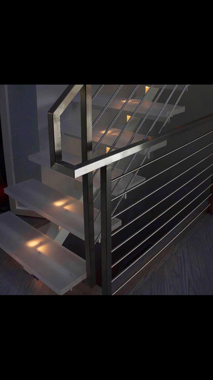Metal railing on a floating staircase in a Vancouver, WA area home
