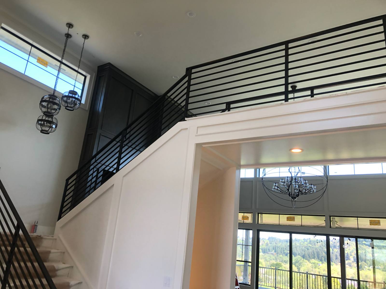 Modern horizontal-bar metal stair railing — custom metal railing, Portland