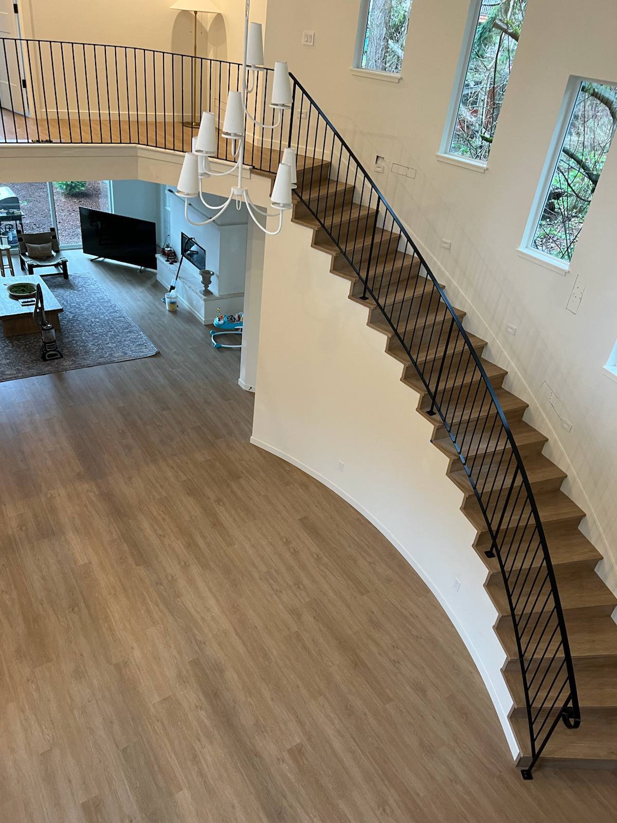 Curved custom metal staircase railing — custom metal railing, Portland