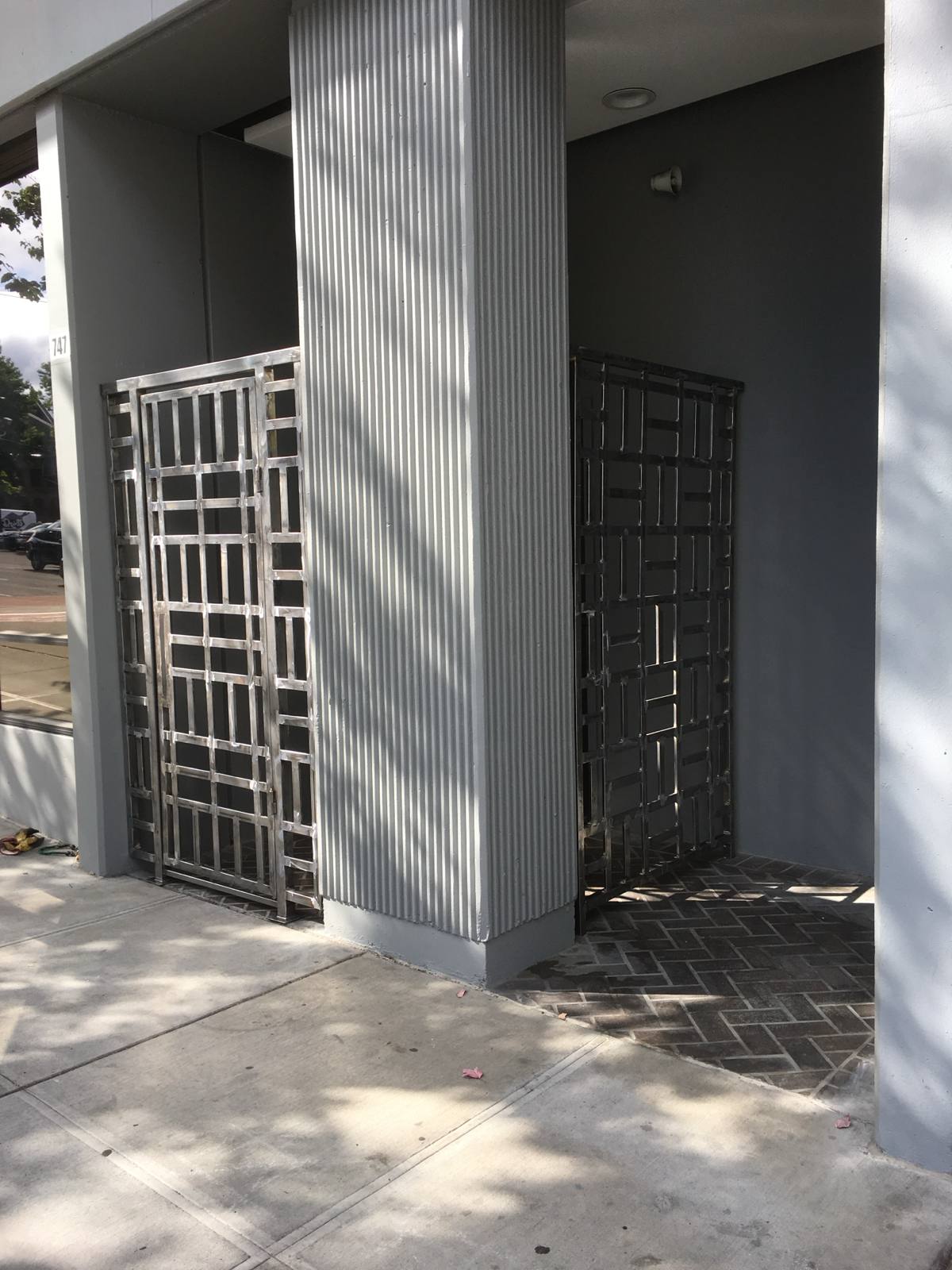 Decorative geometric steel security door by Cascade Mobile Welding