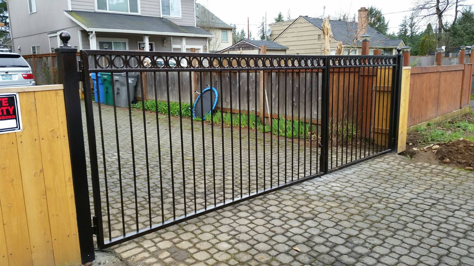 Custom metal double driveway gate by Cascade Mobile Welding
