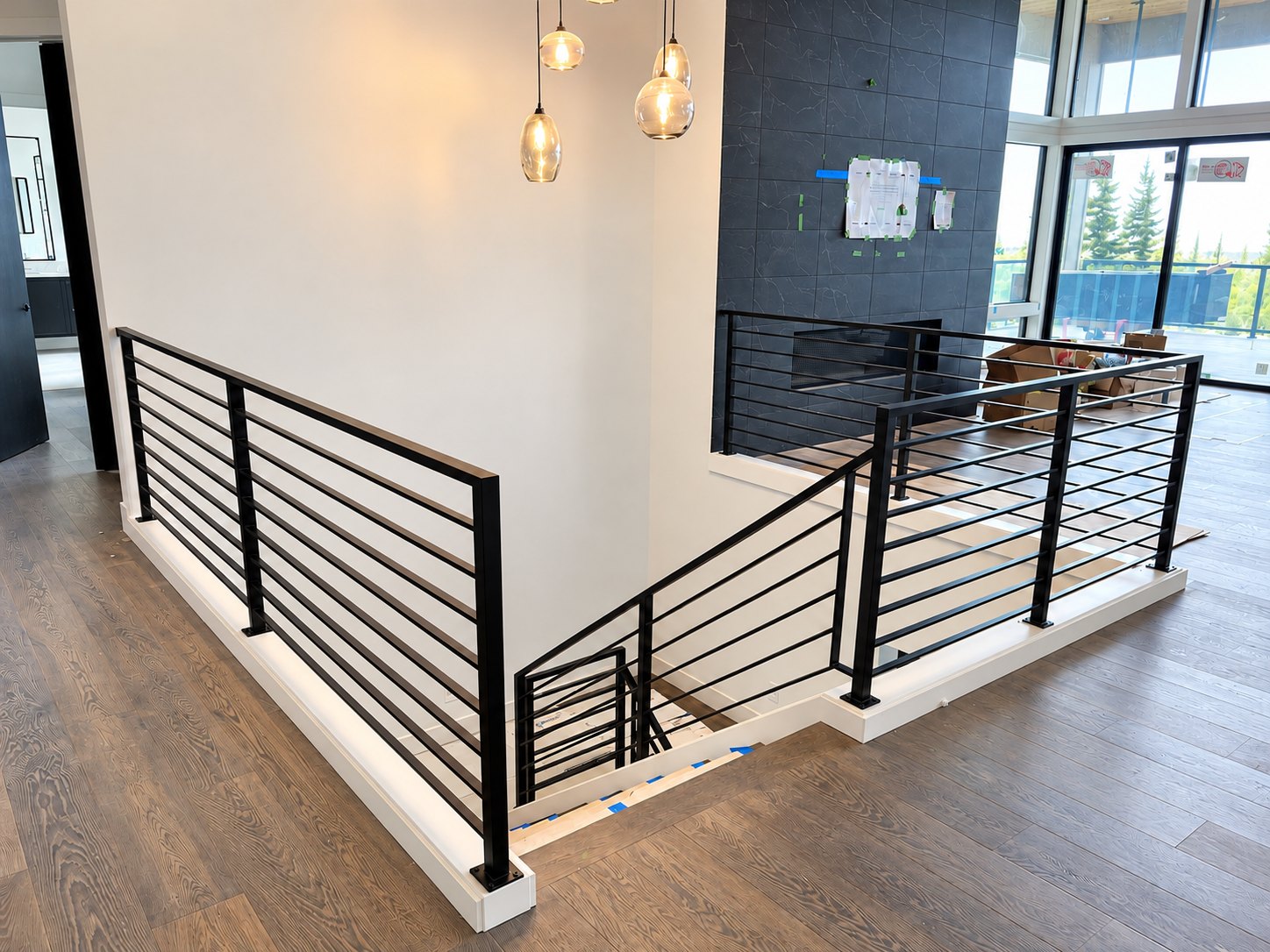 Modern horizontal-bar metal guardrail at an upstairs landing in a Vancouver, WA area home