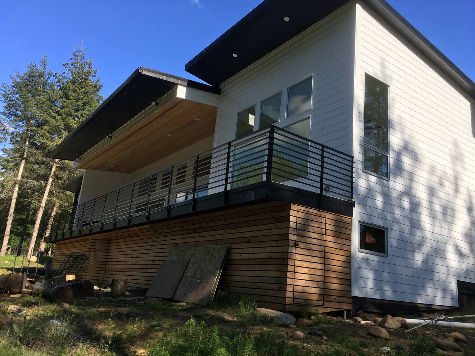 Modern metal deck railing on an elevated deck — welded and installed on site
