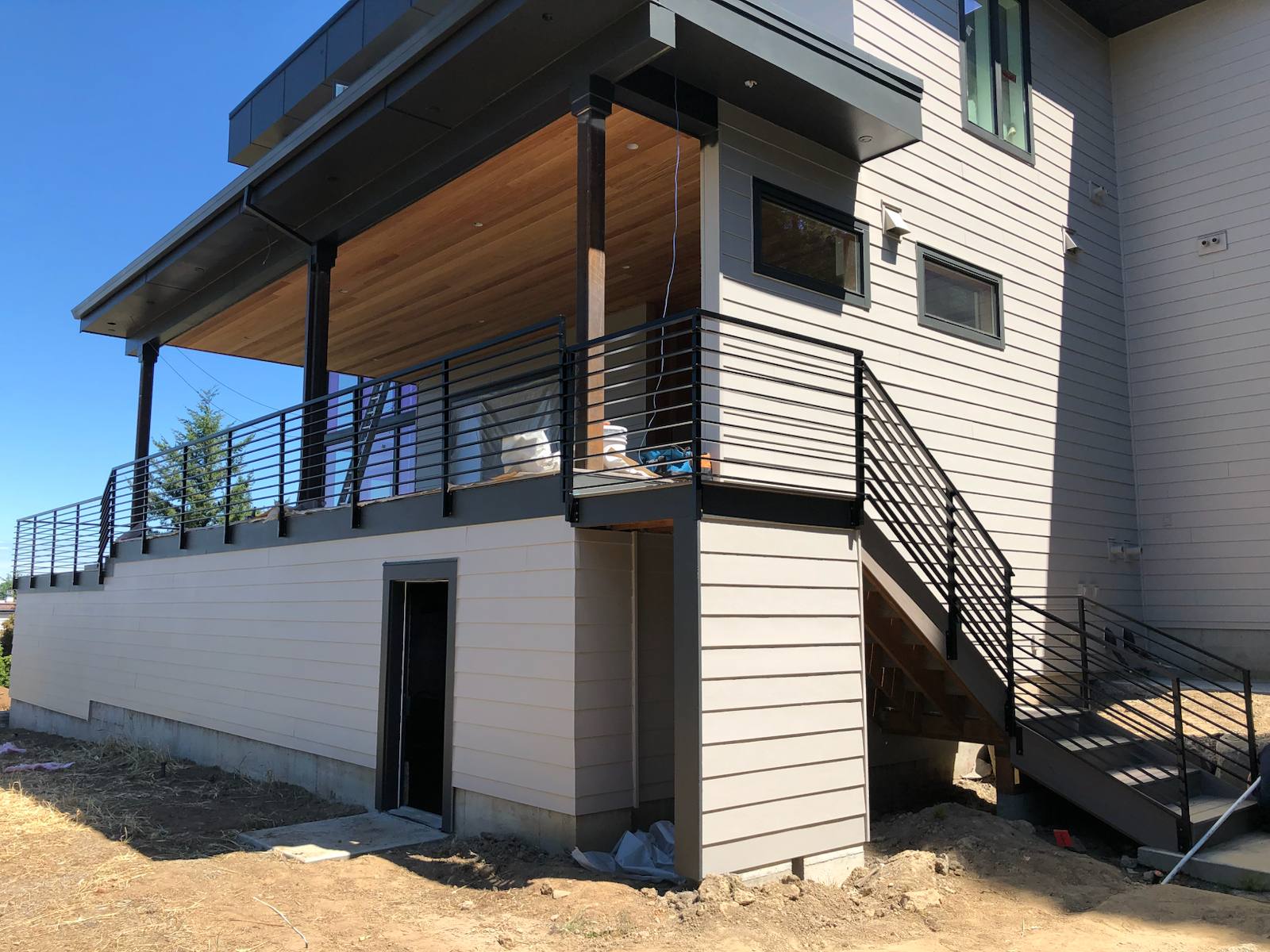 Metal railing on exterior deck stairs — Portland, OR