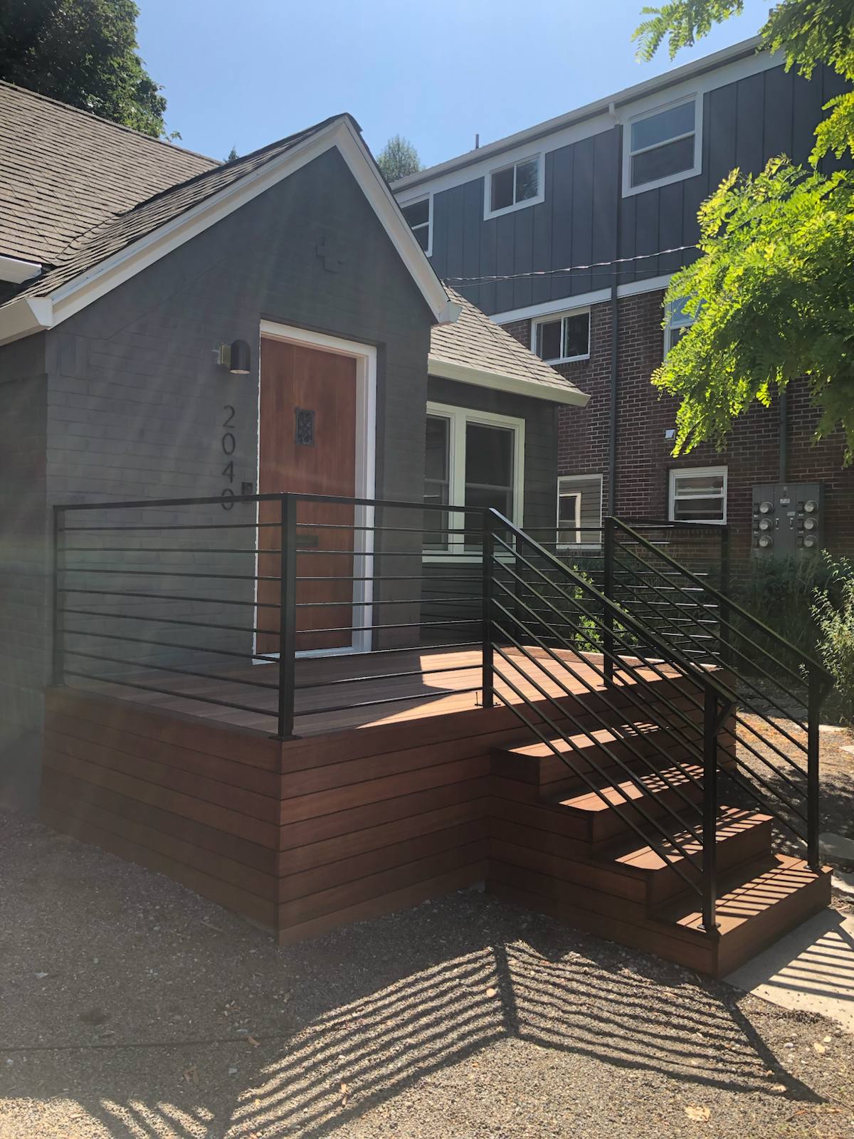 Black metal porch railing and step handrail — Portland, OR