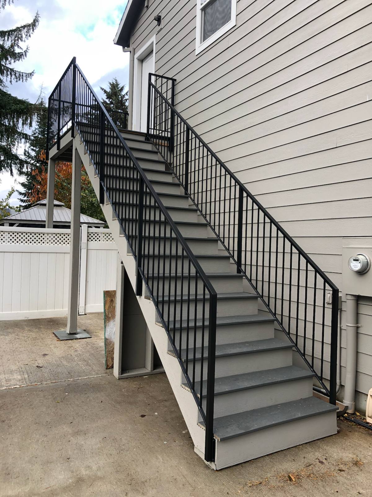 Metal railing on a multi-level exterior staircase — Vancouver, WA area